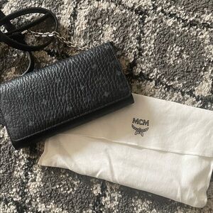 MCM Black Textured Leather wallet. Crossbody